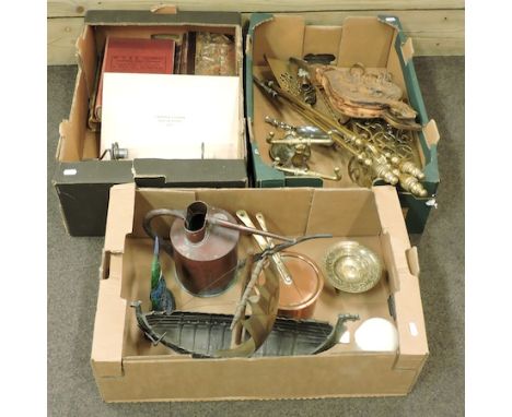 Three boxes of items to include a model ship, copper saucepan, brass fire tools, carved bellows and books