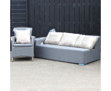 A Sumbrella all weather three seater garden sofa, 180cm, together with a matching chair