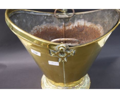 Two brass coal scuttles and a copper kettle
