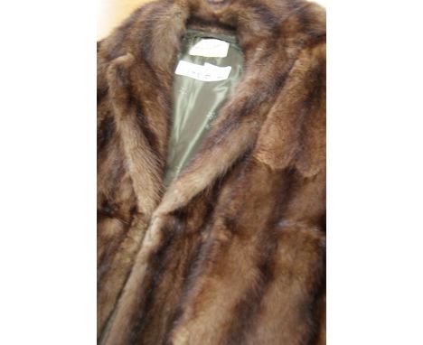 Ladies' 3/4 fur coat, retailed by Arnold Seftor, Edinburgh 