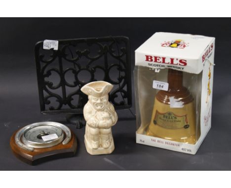 Sundry lot to include a cast metal music stand, a wall barometer, a ceramic Toby jug and a Bells decanter