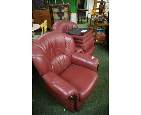 Two single-seater leather armchairs with a pouffe