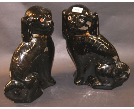 Pair of large 19th Century ceramic Staffordshire spaniels 