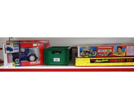 A sundry lot of boxed toys to include Britain's Ford tractor, Leyland transporter, Britain's livestock building plus farm ani