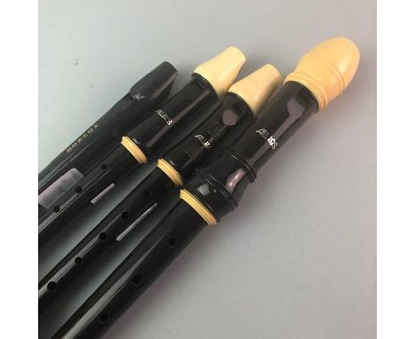 THREE AULOS RECORDERS AND A HOHNER RECORDER, the longest 48cm