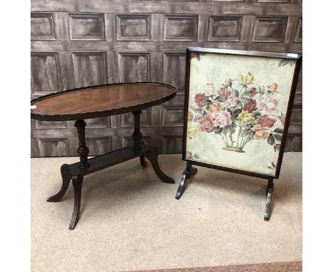 REPRODUCTION OVAL COFFEE TABLE, 54cm high, along with a firescreen (2)
