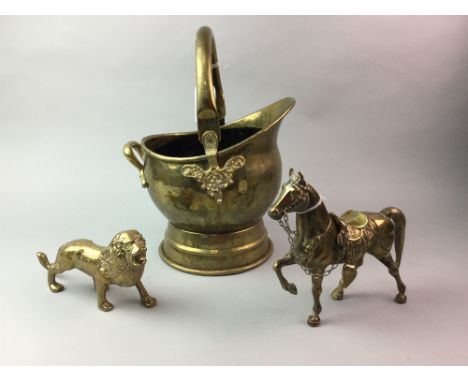 COPPER KETTLE, along with a pair of brass candlesticks, two brass animal figures of a lion and a horse, a set of brass fire t