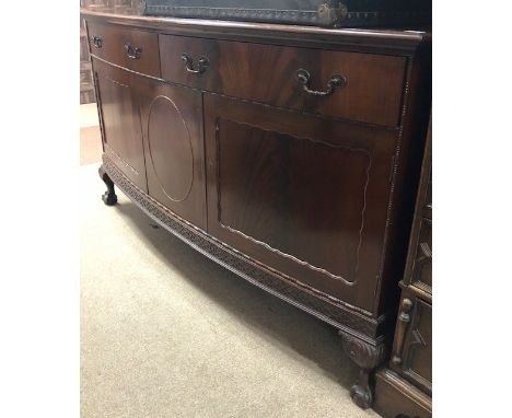 EARLY 20TH CENTURY MAHOGANY BOW-FRONTED SIDEBOARD, on short cabriole legs, 184cm wide