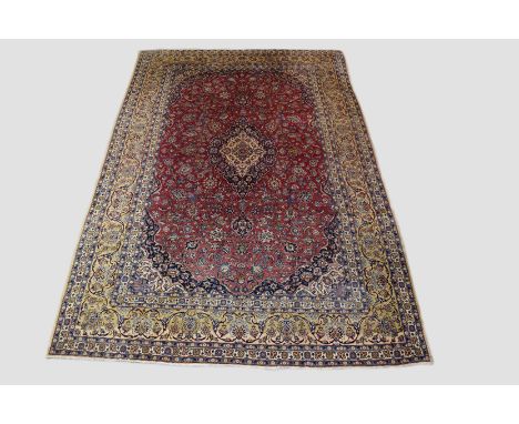 Kashan carpet, (reduced) west Persia, circa 1950s, 13ft. 6in. x 9ft. 4.12m. x 2.75m. Slight wear in places; reduced in length