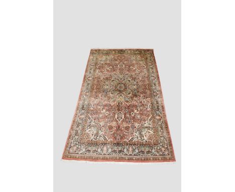 Attractive Kashmiri silk carpet, north India, last quarter 20th century, 10ft. 9in. X 5ft. 11in. 3.28m. X 1.80m. Very light r