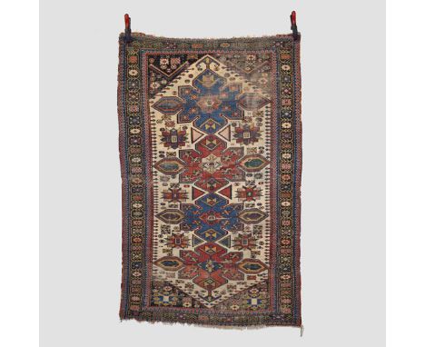 Two Shirvan rugs, south east Caucasus, second half 19th century: the first a rug, 5ft. 9in. X 3ft. 7in. 1.75m. X 1.09m. Overa