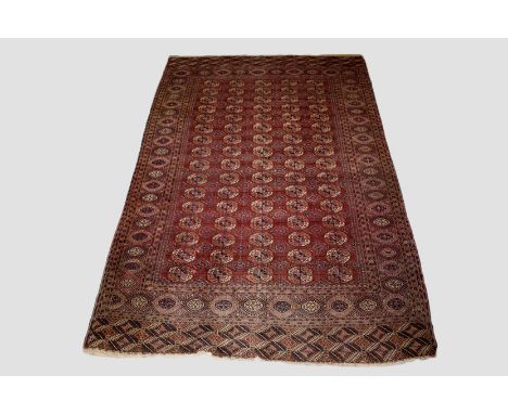 Tekke Turkmen  5 x 16 gul carpet, Turkmenistan, late 19th century, 11ft. 6in. X 7ft. 6in. 3.50m. X 2.29m. Overall even wear w