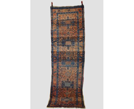Karaja runner, north west Persia, circa 1930s-40s, 10ft. 3in. X 3ft. 1in. 3.12m. X 0.94m. Slight loss to lower end; crease ma