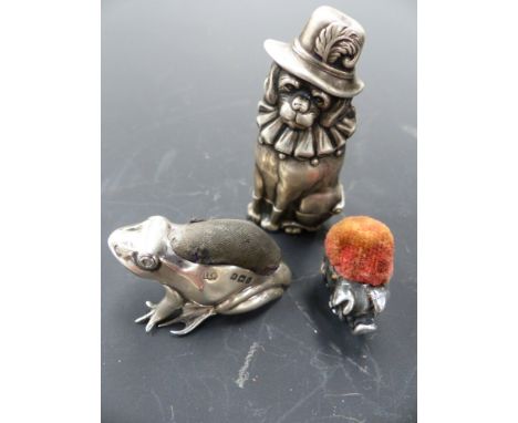 A victorian silver vesta case modelled in the form of"Toby" (Mr Punchs dog), B'ham 1890 together with a silver pin cushion of