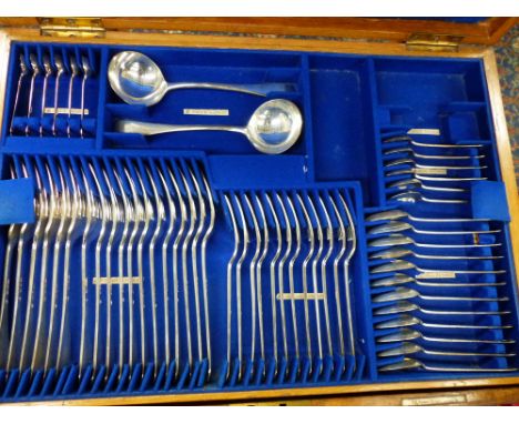 An oak cased canteen of silver cutlery comprising 18 table forks, 12 dessert forks, 12 teaspoons, 6 egg spoons, 6 salt spoons
