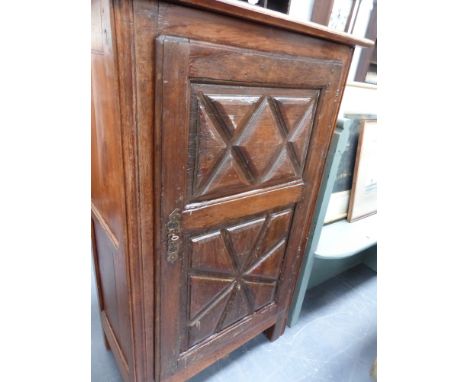 A continental chestnut small cabinet with single panel door and shelf interior