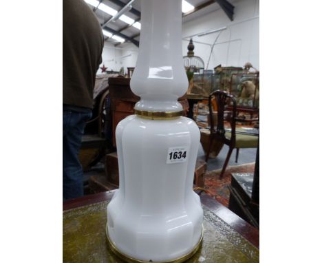 An antique opaline glass table lamp