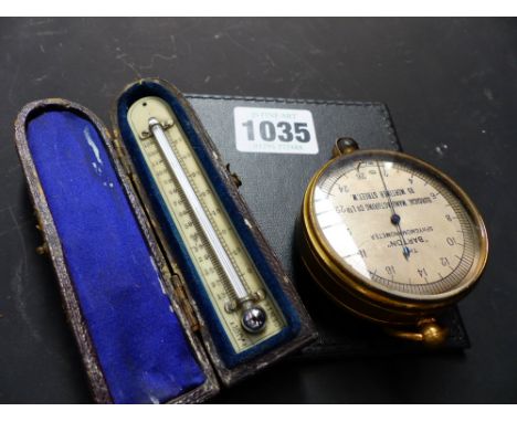 A 19th Century sphygnomanometer gauge together with a Georgian ivory thermometer