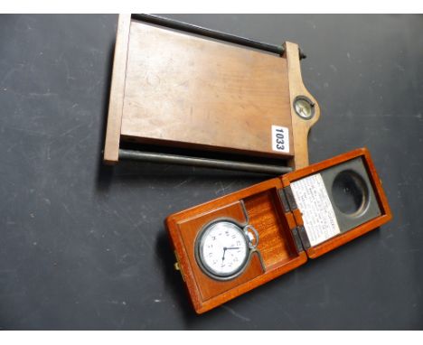 A rare "Houghton-Butcher" 1915 bowood and brass map holder with integral compass together with an RAF navigation master watch