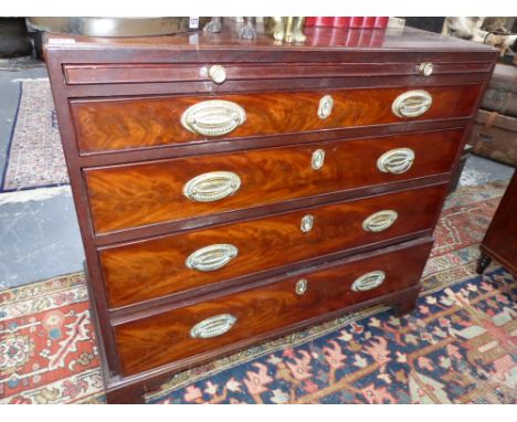 A Geo.III.mahogany batchelor's chest caddy topped over brushing slide and four graduated drawers. 92cms wide