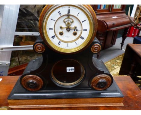 A Victorian slate marble and oak large mantle clock with striking movement signed Henri Marc, Paris. 43cms high overall