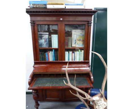 An early 19th.c.mahogany secretaire bookcase. 115cms wide x 89cms high