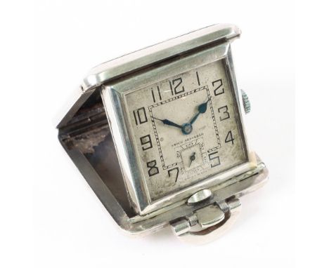 An Art Deco engine turned silver cased purse watch/timepiece, English Import marks, the silvered dial with Arabic numerals an