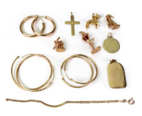 Gold items comprising; Four gold charms, seated poodle, bulldog, windmill, lamp post; two pairs of gold hoop earrings, three 