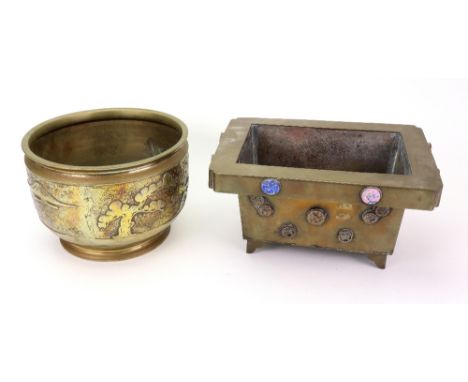 A Chinese rectangular brass jardiniere, circa 1900, the sides applied with scattered roundels of birds, insects and flowers, 