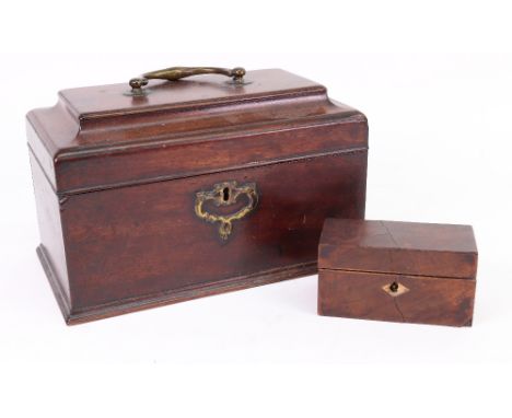 A George III mahogany rectangular tea caddy, the moulded hinged cover enclosing three divisions, 23.5cm wide, and a small sim