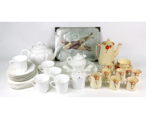 A Shelley white glazed tea service, with lobed sides and fluting, twenty three pieces, a Homeleigh ware Mayfair pattern twelv