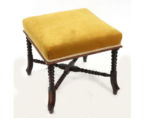 A Victorian walnut frame square stool, circa 1860, with upholstered seat, on bobbin turned legs with shaped splayed feet unit
