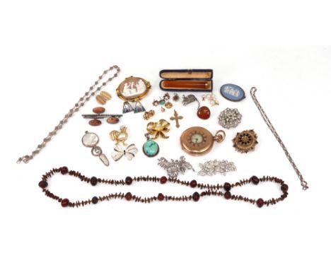 A quantity of mostly costume jewellery to include; an amber and gold cheroot holder, cased, a 9ct gold crucifix pendant, a pa