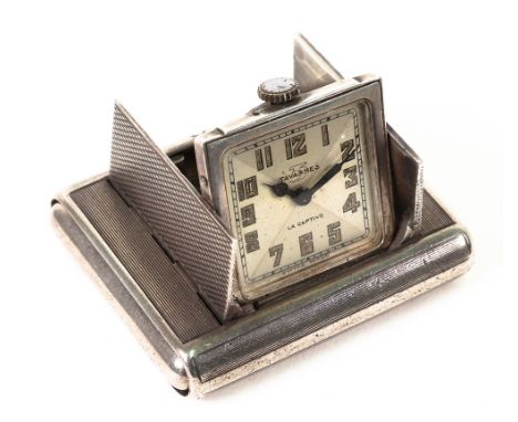 Tavannes La Captive - an Art Deco silver cased folding watch/timepiece, English Import marks for 1924, the rectangular engine
