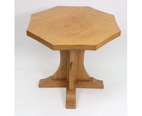 A Robert 'Mouseman' Thompson golden oak octagonal coffee table, circa 1930, on quadripartite base, with mouse signature, 49cm