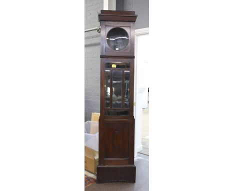 An Art Deco oak longcase clock case, 203cm high, and two weights, lacking movement. .