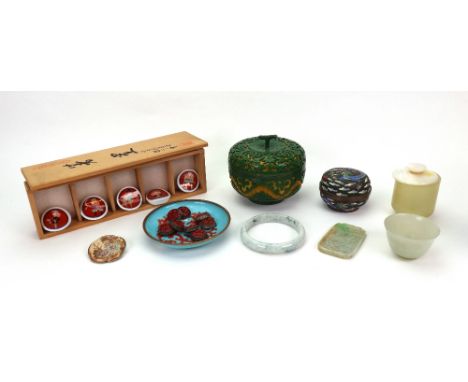 A group of Chinese and Japanese works of art, late 19th/20th century, comprising, a Satsuma brooch enamelled with flowers, 4c