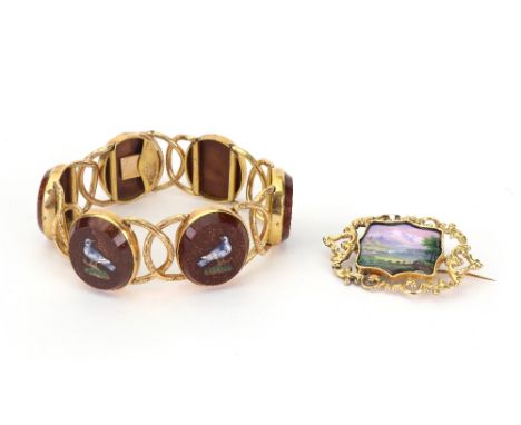 An Italian gilt metal and pietra dure panel bracelet, late 19th century, with six oval panels hardstone inlaid depicting dove