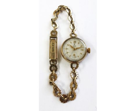 Tudor; a lady's Tudor Royal 9ct yellow gold manual wind wristwatch, Chester 1954, the bracelet strap stamped 'Rolex', Birming