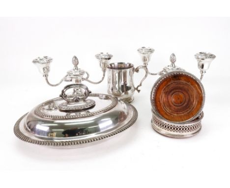 A pair of George IV style electroplate dwarf three light candleabrum, 15cm high, an oval entree dish, a pair of coasters and 