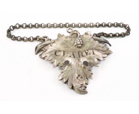 A Victorian silver fruiting vine leaf bottle ticket, Charles Rawlings & William Summers, London 1843, pierced 'CLARET', 6.5cm