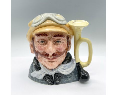 Yellow hat, green coat, white scarf. Royal Doulton backstamp. Artist: David B. BiggsIssued: 1973 - 1983Dimensions: 7.75"L x 6