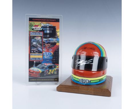 This pair includes a commemorative ticket for the 1999 Daytona 500, #1609 of 10,000 and a replica helmet of Gordon's with his