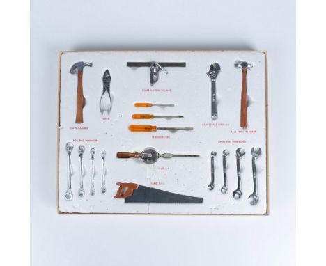 A set of 18 tools in silver-tone metal finish. Made for children and those interest in craftsmanship. Includes hand saw, hand