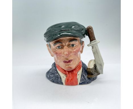 Green cap, blue jacket, white shirt, orange scarf. Royal Doulton backstamp. Artist: Stanley J. TaylorIssued: 1988Dimensions: 