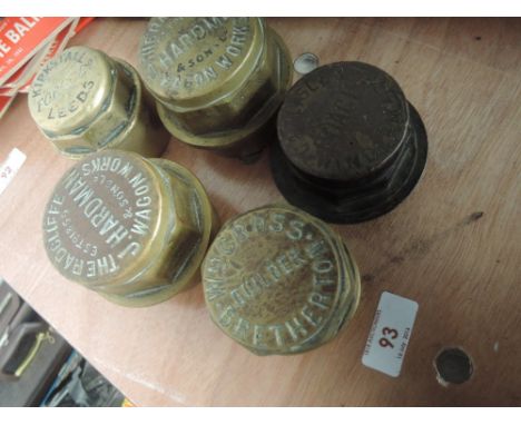 A selection of vintage brass wheel bearing caps including Kirkstall Forge, Leeds