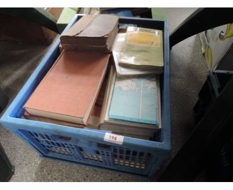 A box of vintage volumes, photograph albums and maps