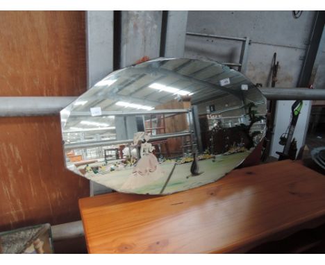 A vintage wall mirror with painted pictorial decoration