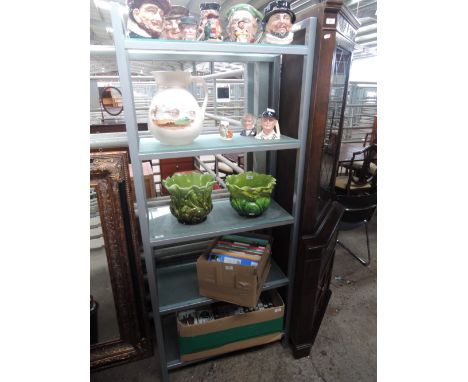 A modern grey and glass shelf unit