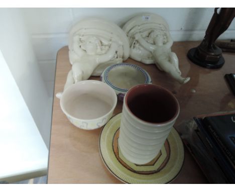 A selection of Poole pottery including shelf mounts, bowls ets